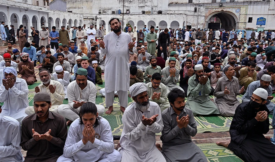 Muslim devotees offer their prayers on the first Friday of the holy month of Ramadan at the Jamia Mosque in Rawalpindi on April 16, 2021. (AFP photo)
