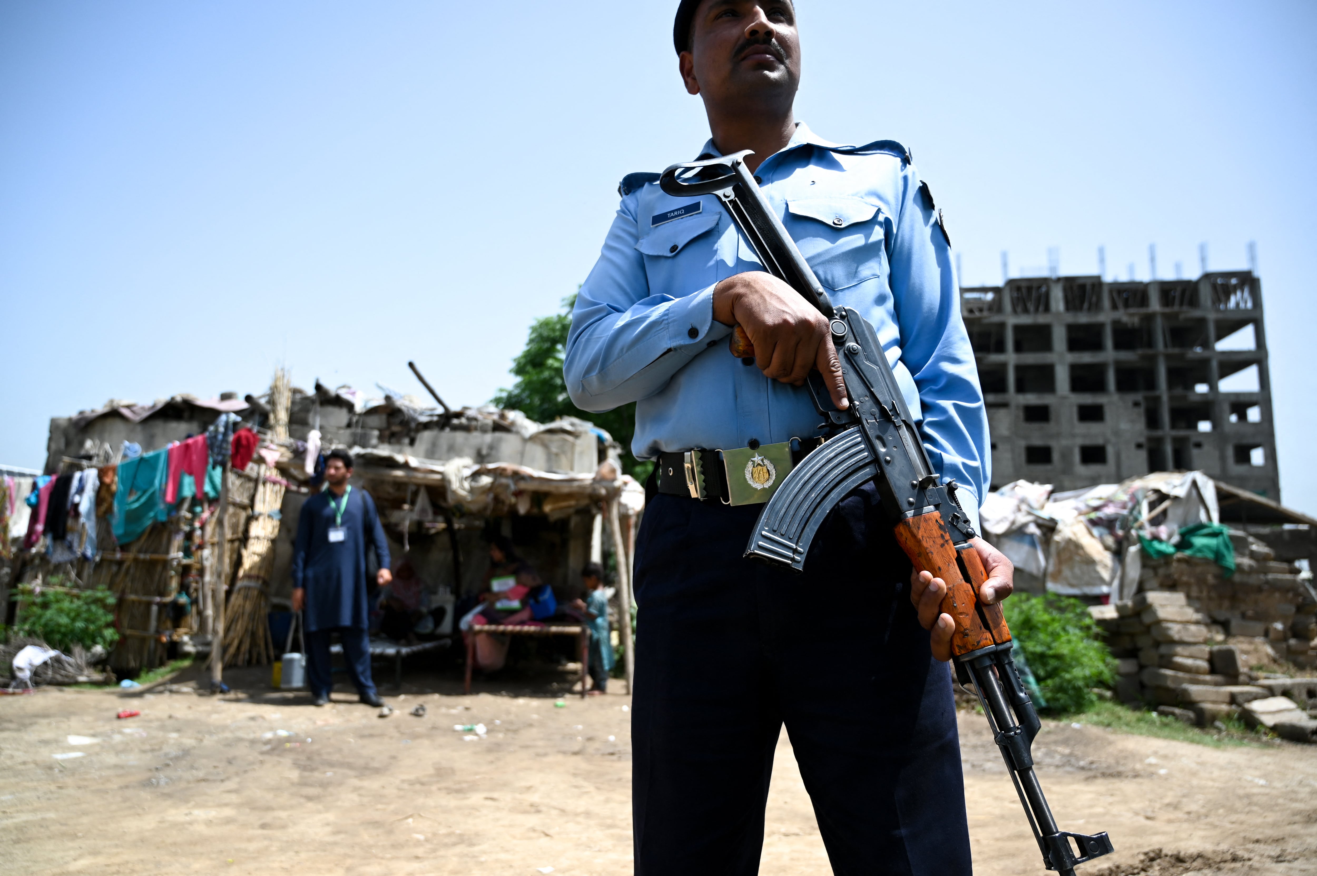 A Pakistani policeman stands guard on the outskirts of Islamabad on April 26, 2019. (AFP/File)