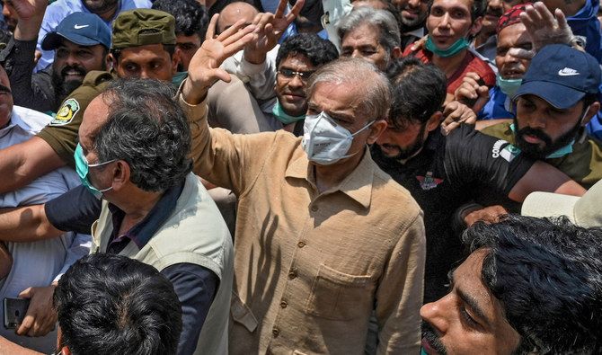 Pakistan's opposition leader Shahbaz Sharif, center, gestures as he arrives at the High Court in Lahore on June 3, 2020. (AFP/File)