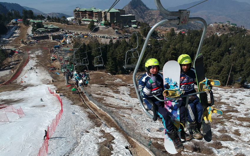 Foreign tourists use a chairlift at an event at the Malam Jabba ski resort in Pakistan's Khyber Pakhtunkhwa province on February 13, 2021. (AFP/File)