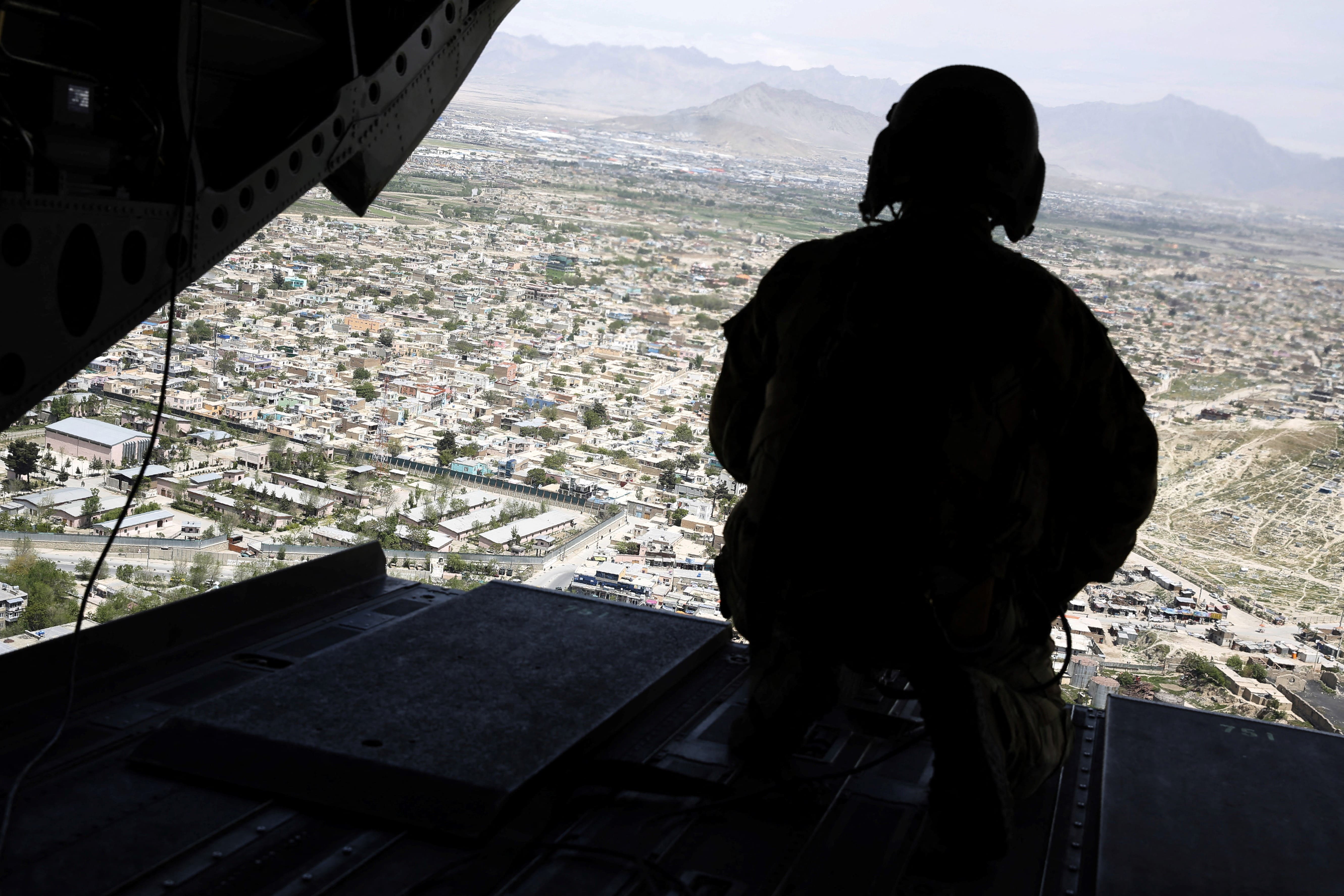A US soldier mans a weapon at the tailgate aboard the helicopter carrying US Defence Secretary James Mattis as he arrives at Resolute Support headquarters in the Afghan capital Kabul on April 24, 2017. ( AFP / File photo)