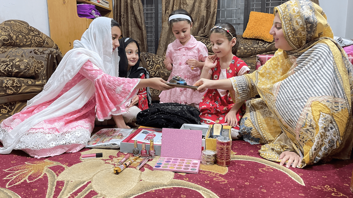Anabia Yusufzai and her cousins inspect Barkha items for their uncle’s fiancée in Mardan, Khyber Pakhtunkhwa, May 7, 2021. (AN photo)