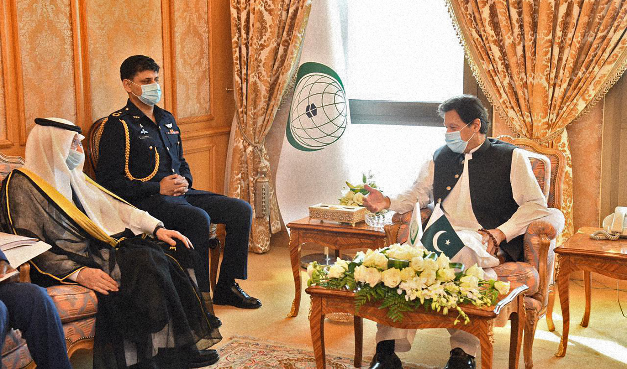 Pakistan’s Prime Minister Imran Khan, right, meets the Organization of Islamic Cooperation (OIC) Secretary-General Yousef Al-Othaimeen, left, in Jeddah, Saudi Arabia on May 10, 2021. (Photo courtesy: OIC/Twitter)