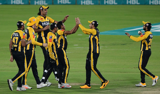 Peshawar Zalmi's players celebrate after the dismissal of Quetta Gladiators' Cameron Delport during the PSL T20 cricket match between Peshawar Zalmi and Quetta Gladiators at the National Stadium in Karachi on February 26, 2021. (AFP)