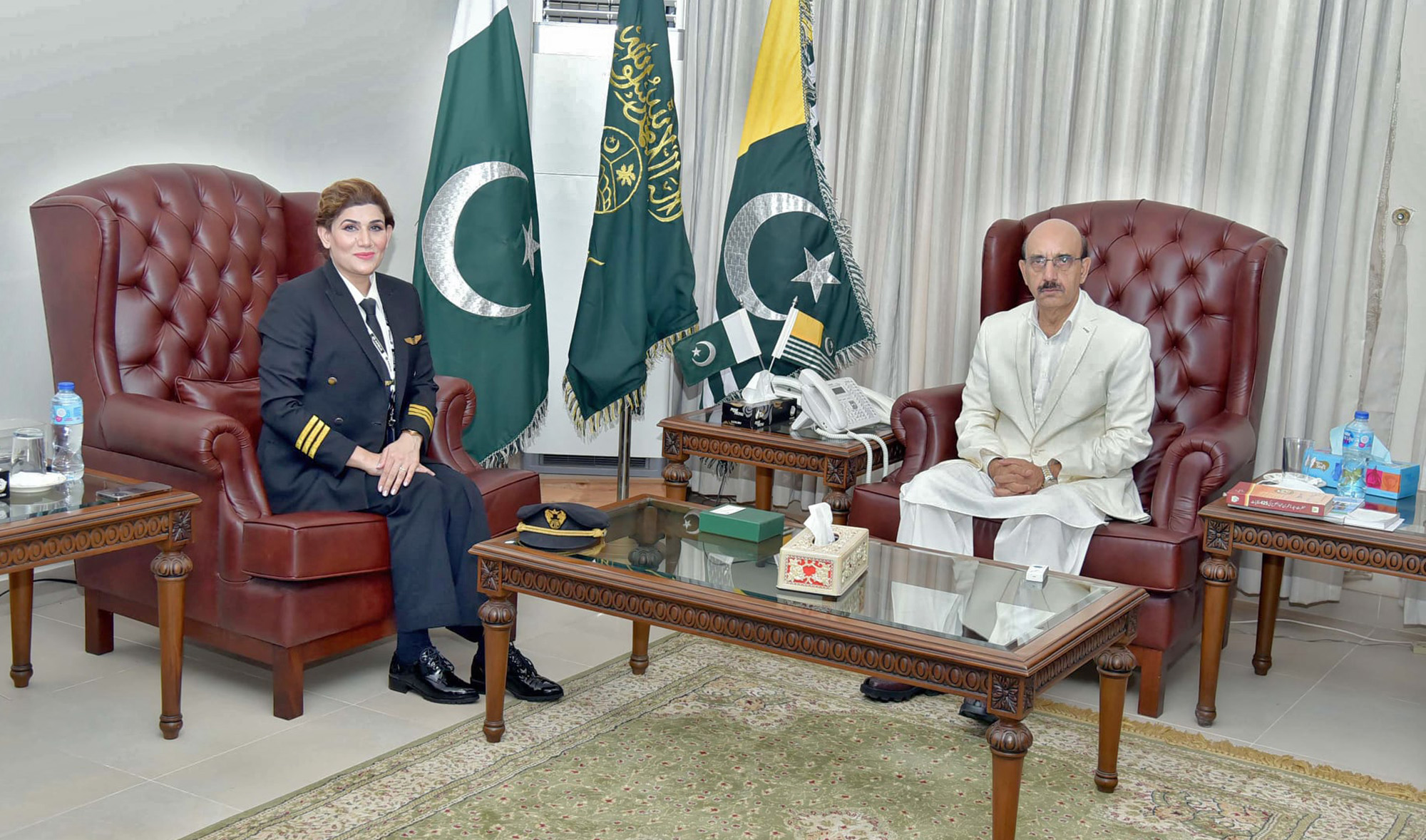 Pakistani pilot Maryam Mujtaba, left, during her meeting with the president of Azad Kashmir in Muzaffarabad, Pakistan, on May 21, 2021. (Photo courtesy: @masood.hatiif/Facebook)