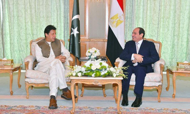 In this file photo, President Abdel Fattah El Sisi (R) received is seen in a discussion with Pakistani Prime Minister Imran Khan (L) at his residence in Mecca on May 31, 2019. (Photo courtesy: Govt. of Egypt)