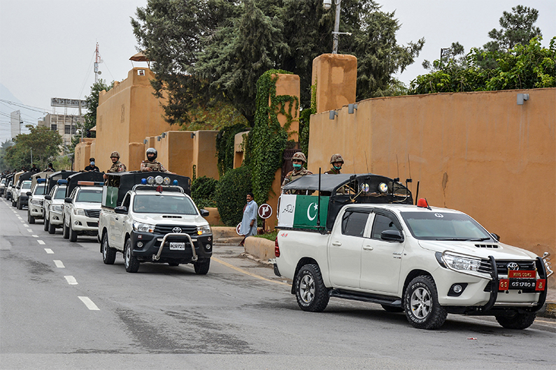 Security and police personnel patrol on a street in Quetta on August 26, 2020. (AFP)