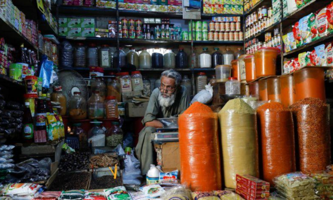 A shopkeeper waits for customers while selling spices and groceries items at the retail market, as the outbreak of the coronavirus disease (COVID-19) continues, in Karachi, Pakistan June 11, 2020. (Reuters/ File)