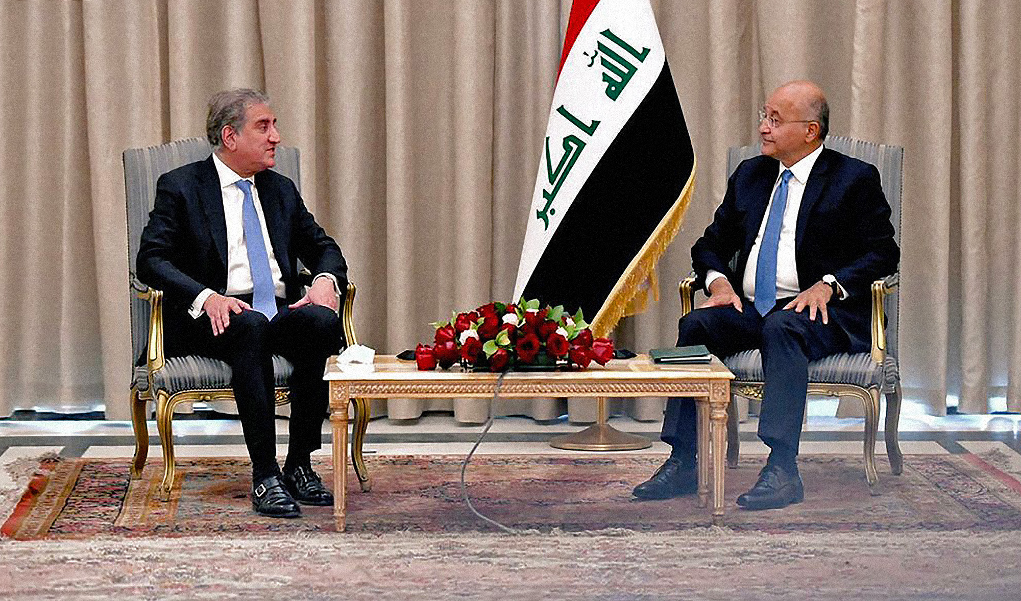 Iraq President Barham Saleh, right, receives Pakistan Foreign Minister Shah Mahmood Qureshi at Presidentail Palace in Baghdad, on May 29, 2021. (Photo courtesy: @SMQureshiPTI/Twitter)