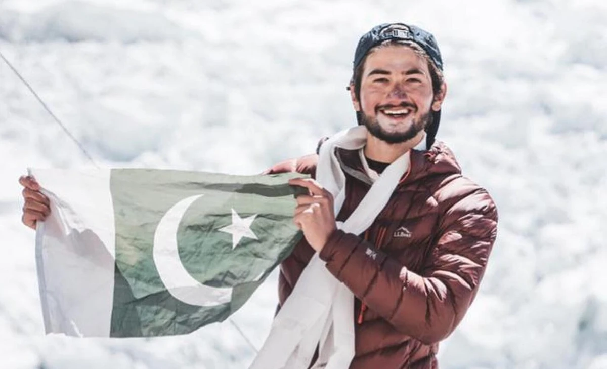 In this undated photo, Shehroze Kashif, a 19-year-old climber from Lahore, is seen holding a flag of Pakistan. (Photo courtesy: Alpine Adventure Guides)