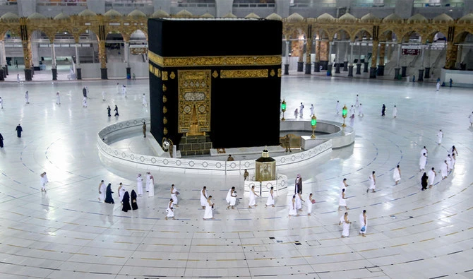 Saudis and foreign residents circumambulate (Tawaf) the Kaaba in the Grand Mosque complex in the holy city of Makkah, on October 4, 2020. (AFP/ File)