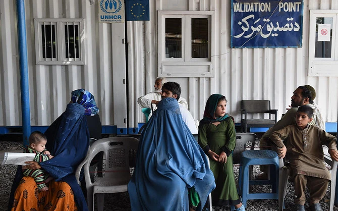 Afghan refugees wait at the registration centre in the Pakistani city of Peshawar on June 23, 2016. (AFP/File)