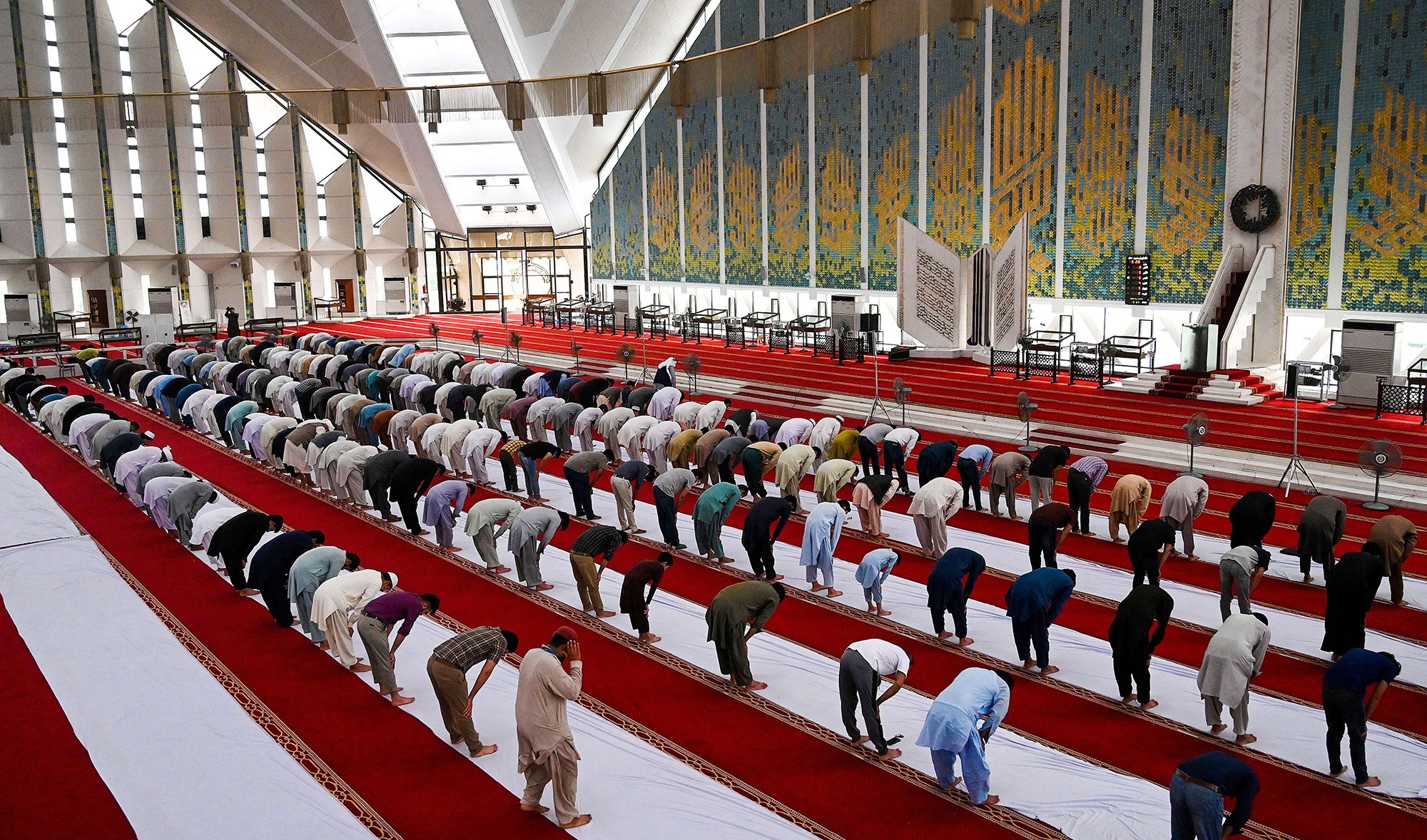 Muslims offer a prayer at the Grand Faisal Mosque in Islamabad, Pakistan, amid the Covid-19 coronavirus pandemic on May 3, 2021. (AFP/File)