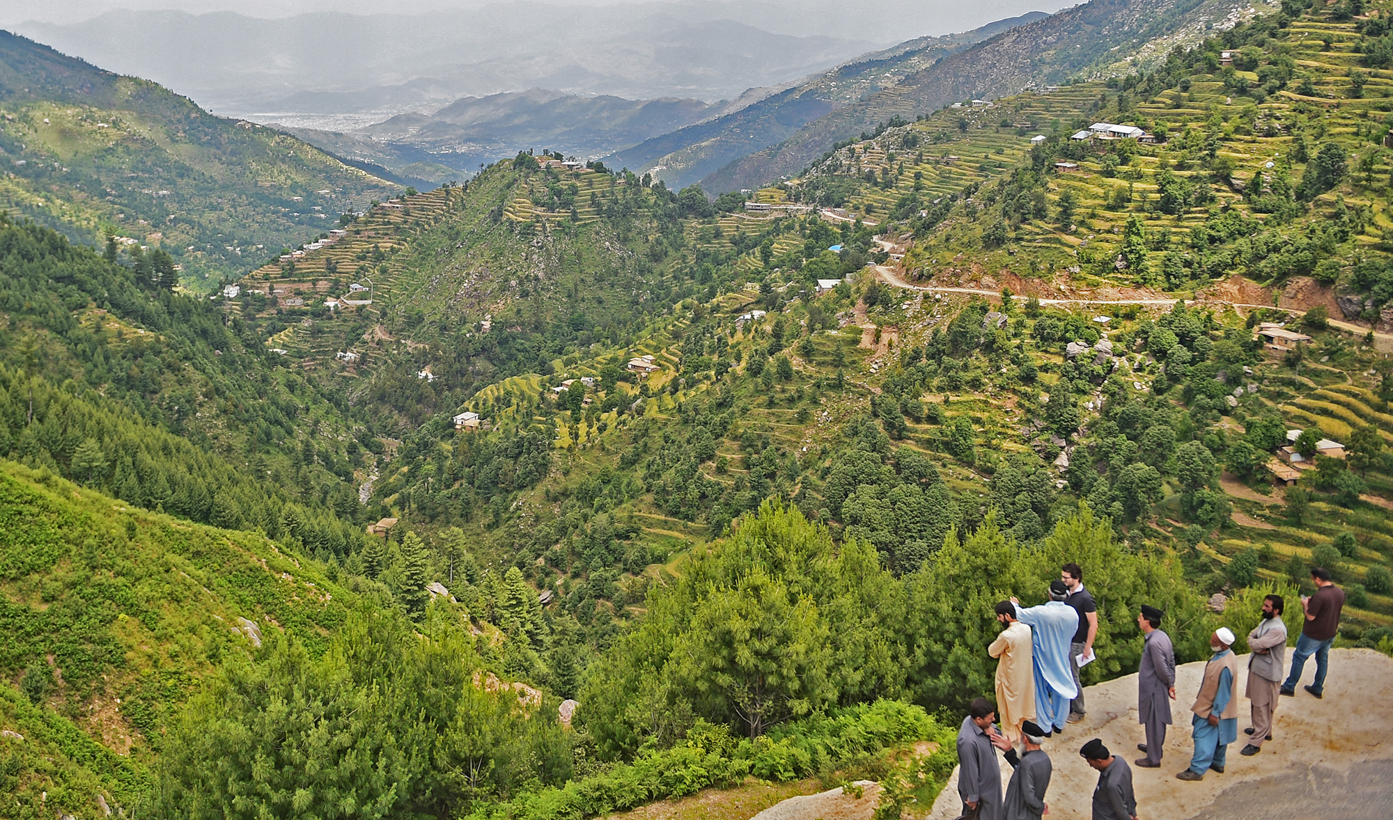 Officers of the Khyber Pakhtunkhwa forest department gather overlooking the forest in Swat valley in northwest Pakistan on May 18, 2018. (AFP/File)