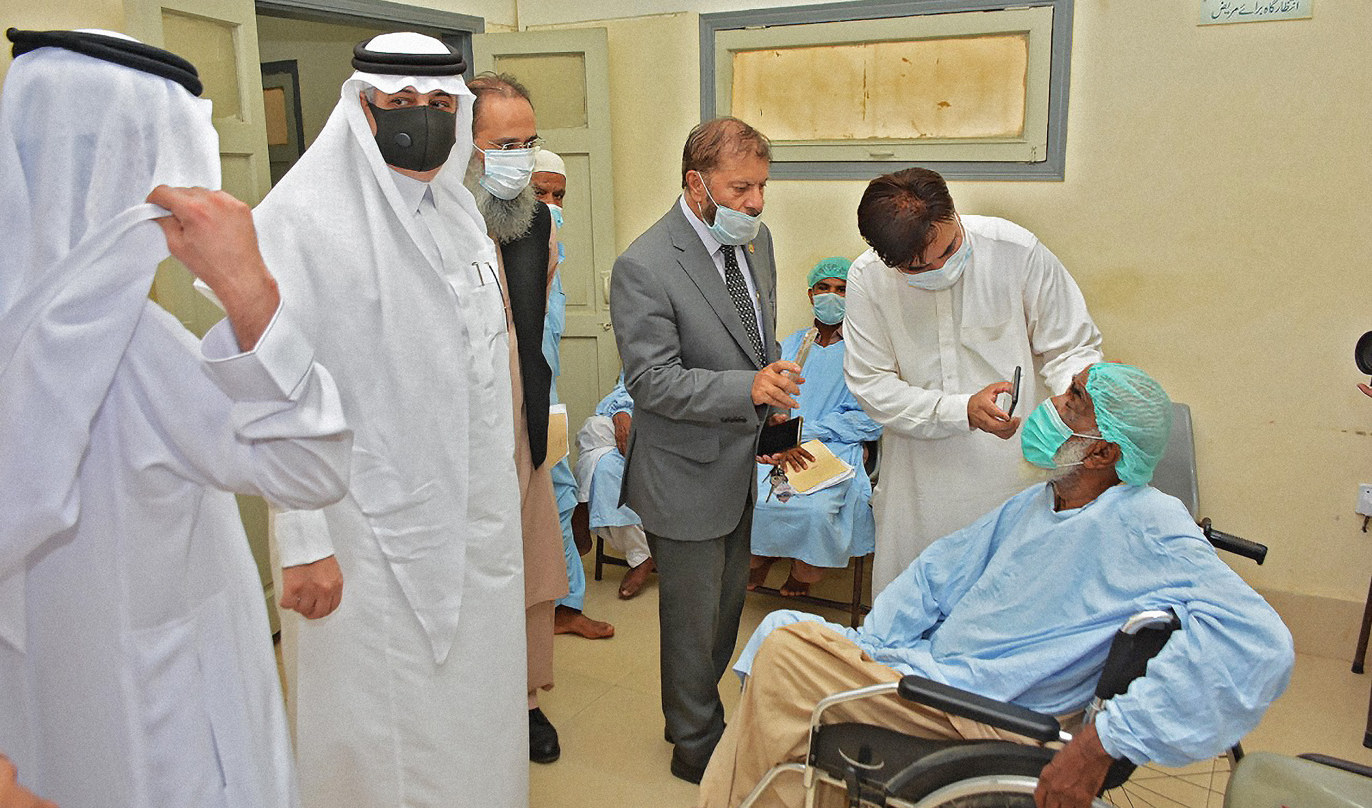 This photo shared by Saudi embassy in Islamabad on June 5, 2021 shows doctors examining a patient during the launch of KSRelief's medical campaign to combat blindness in Pakistan. (Photo courtesy: @KSAembassyPK/Twitter)