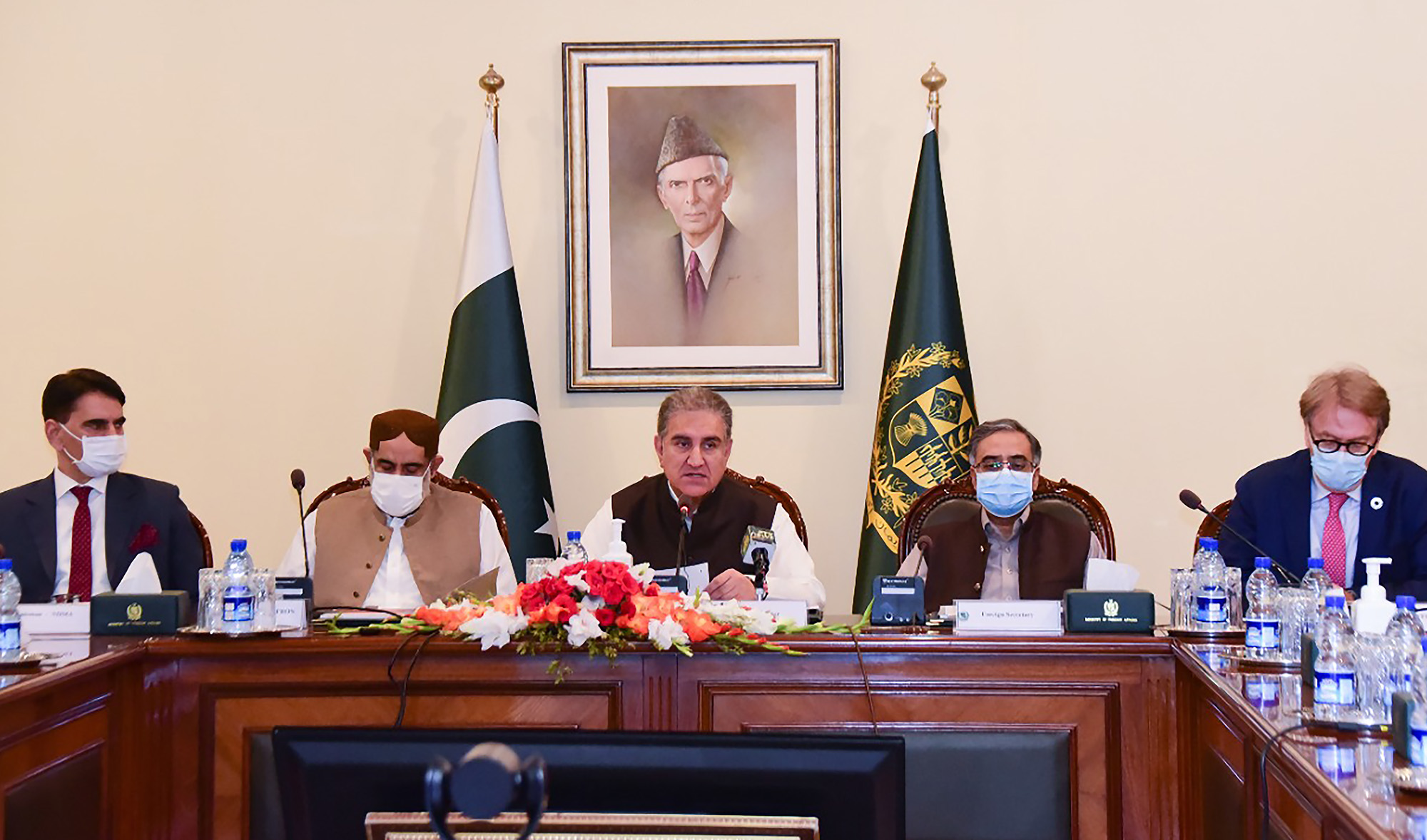 Pakistan foreign minister Shah Mahmood Qureshi, center, at the post-launch press conference of Humanitarian Response Plan (HRP) in Islamabad on June 9, 2021. (Photo courtesy: @SMQureshiPTI/Twitter)