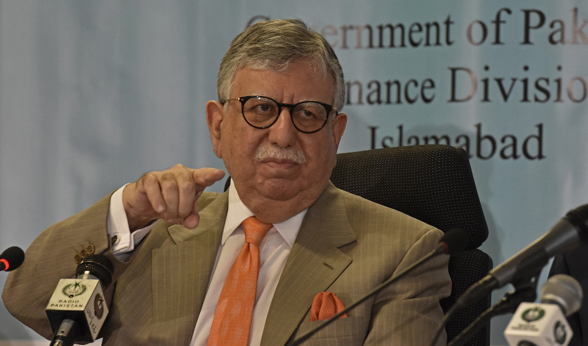 Pakistan's Finance Minister Shaukat Tarin gestures during a pre-budget press conference in Islamabad on June 10, 2021. (AFP)