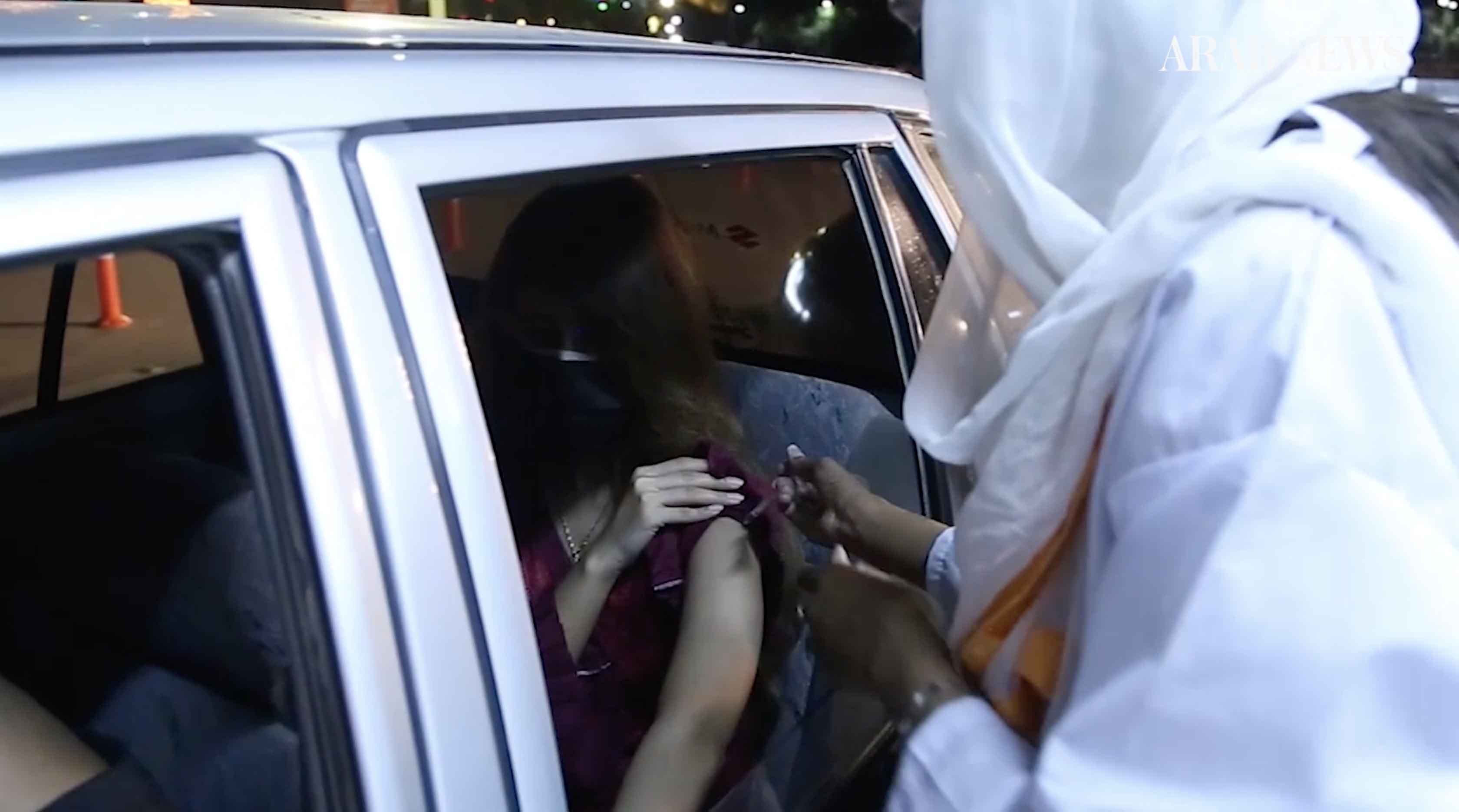 A Lahore resident is getting inoculated at Pakistan’s first drive-through COVID-19 vaccination center in Lahore on June 10, 2021. (AN photo)