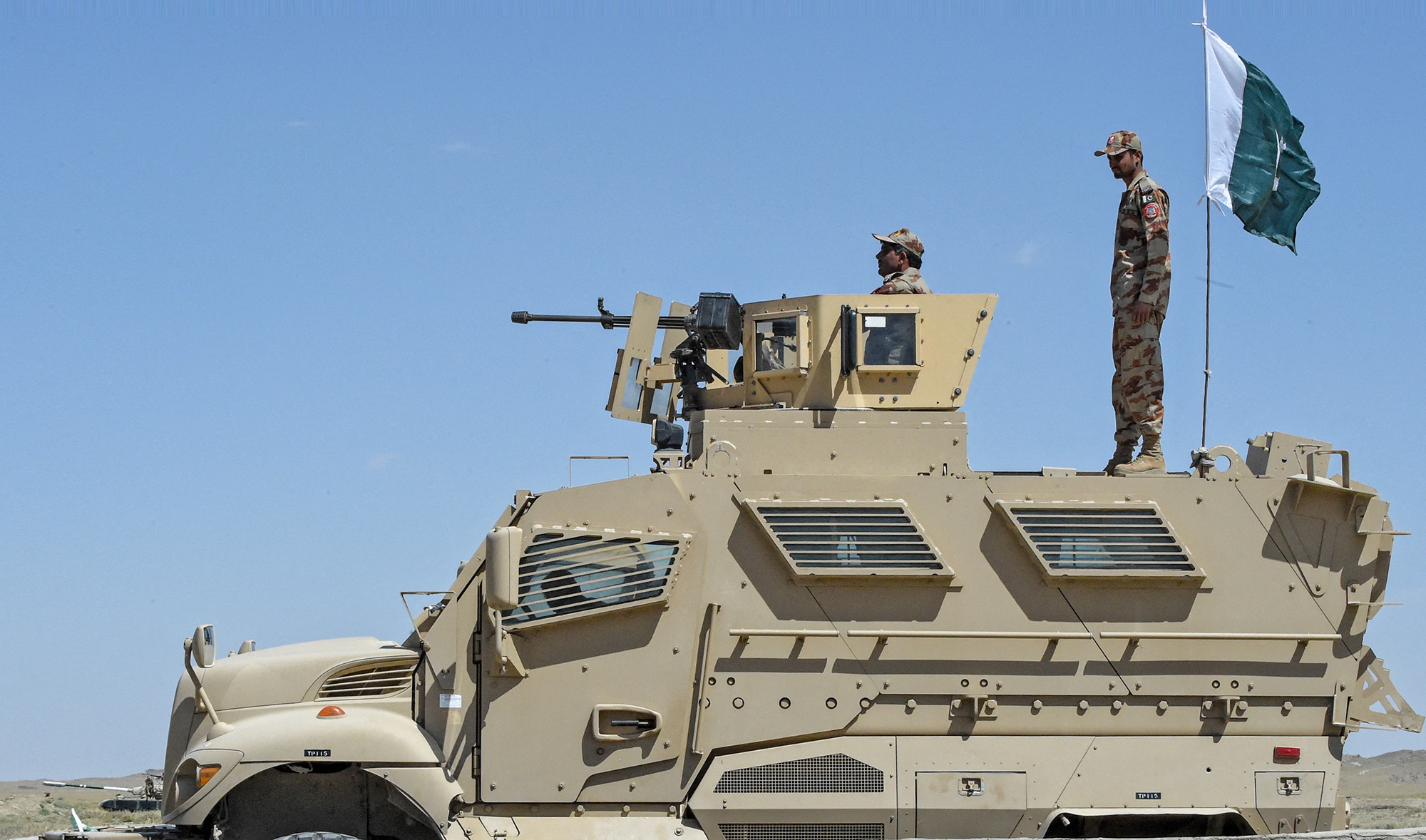 Pakistan's Frontier Corps personnel stand on an armored vehicle near a border crossing point between Pakistan and Afghanistan in Balochistan on September 16, 2020. (AFP/File)
