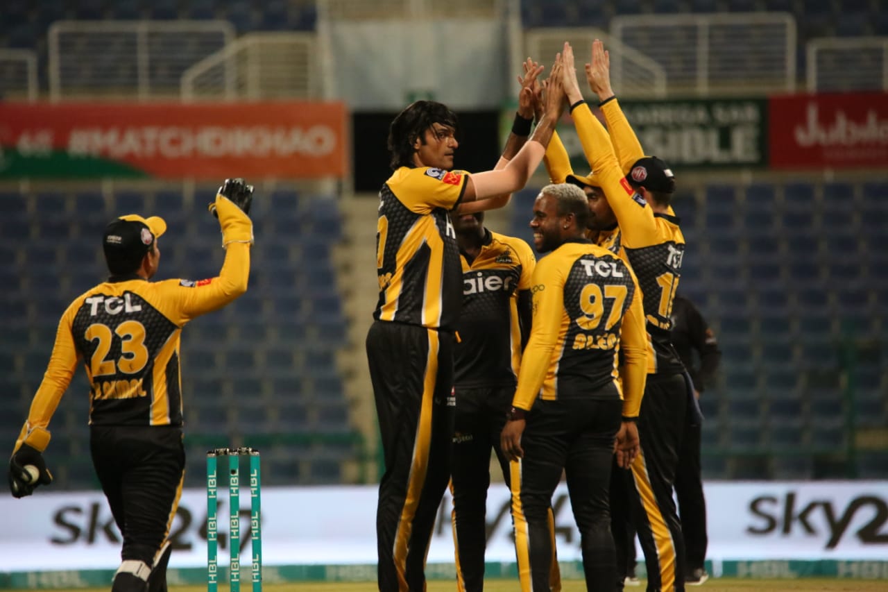 Peshawar Zalmi's Mohammad Irfan (C) celebrates with teammates the wicket of Quetta Gladiators' player (not pictured) during the Pakistan Super League (PSL) T20 cricket match between Peshawar Zalmi and Quetta Gladiators at the Sheikh Zayad Stadium in Abu Dhabi on June 12, 2021. (Photo courtesy: Social Media)
