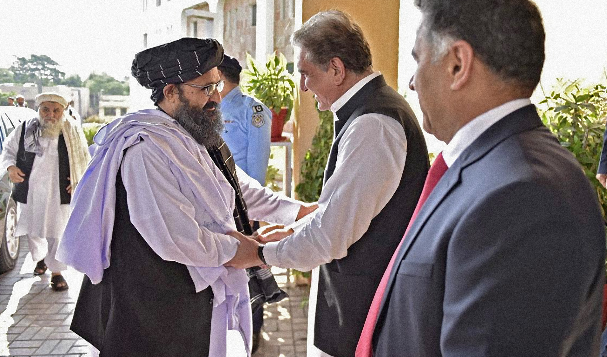 Pakistan's Foreign Minister Shah Mehmood Qureshi welcomes Mullah Abdul Ghani Baradar. upon his arrival at the Ministry of Foreign Affairs office in Islamabad, Pakistan on October 3, 2019. (Photo courtesy: Ministry of Foreign Affairs)