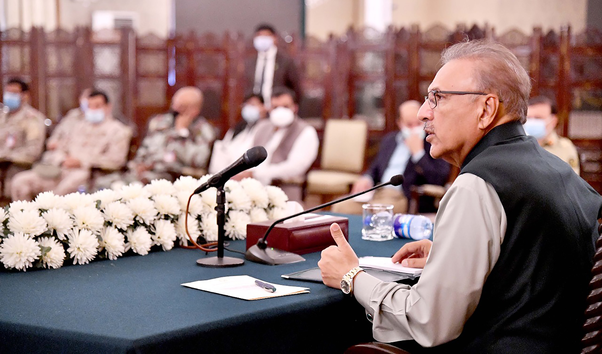 Pakistan's president Arif Alvi speaks during a session with military officers from 12 countries who were attending a security workshop by the National Defense University in Islamabad on June 25, 2021. (Photo courtesy: @PresOfPakistan/Twitter)