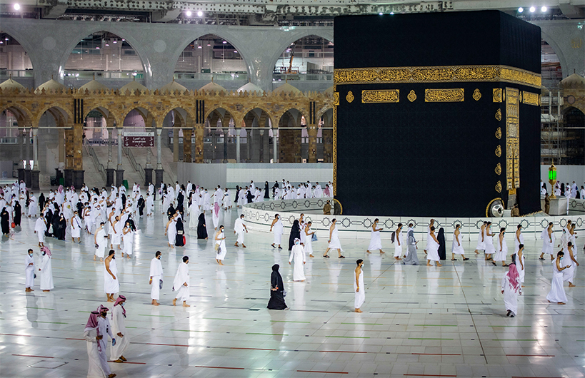 A handout picture provided by the Saudi Ministry of Hajj and Umrah on October 4, 2020, shows Saudis and foreign residents circumambulating the Kaaba (Tawaf) in the Grand Mosque complex in the holy city of Makkah. (AFP)