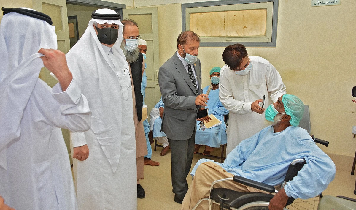 This photo shared by Saudi embassy in Islamabad on June 5, 2021 shows doctors examining a patient during the launch of KSRelief's medical campaign to combat blindness in Pakistan. (Photo courtesy: @KSAembassyPK/Twitter)