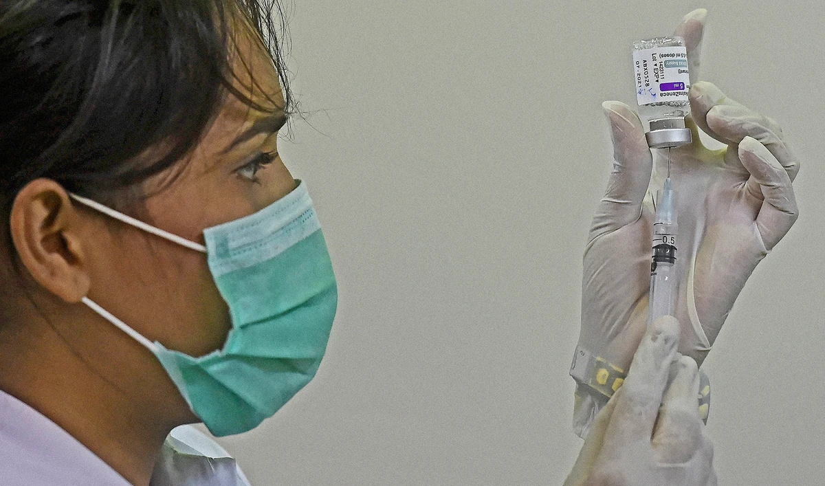 A health worker prepares a dose of the Covishield AstraZeneca-Oxford's Covid-19 coronavirus vaccine at a vaccination centre in Karachi on May 12, 2021. (AFP/File)