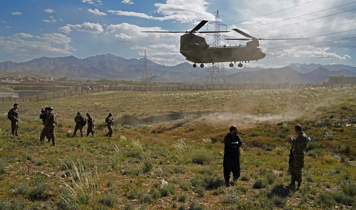 A US military Chinook helicopter lands on a field in Maidan Shar, capital of Wardak province of Afghanistan, on June 6, 2019. (AFP/File)
