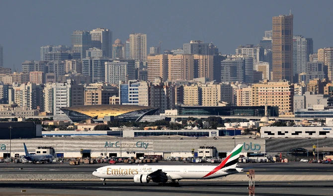 A picture shows an Emirates Airlines airplane at Dubai International Airport on February 1, 2021. (AFP)
