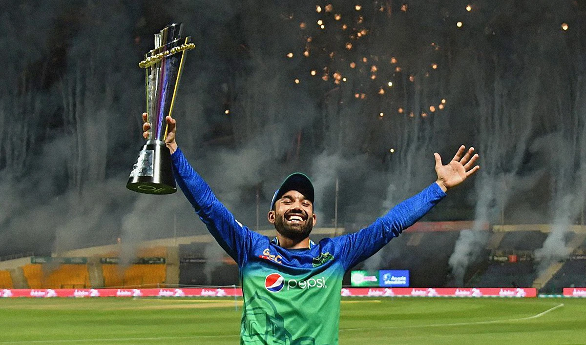 Jubilant Multan Sultans captain Muhammad Rizwan, lifts the Pakistan Super League trophy as his team won the tournament after defeating Peshawar Zalmi in the final held in Abu Dhabi on June 24, 2021. (Photo courtesy: @thePSLt20/Twitter)