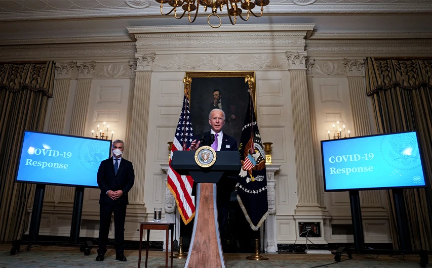 U.S. President Joe Biden speaks about the coronavirus pandemic in the State Dining Room of the White House on January 26, 2021 in Washington, DC. (AFP)