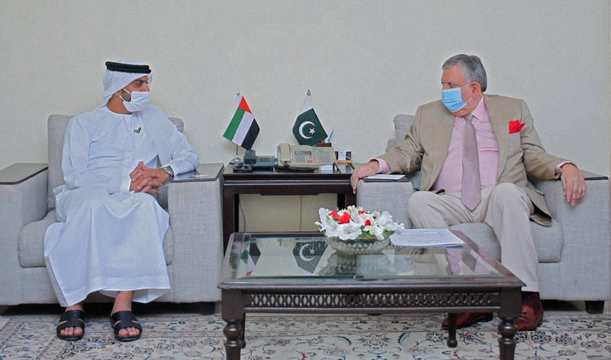 UAE's Ambassador to Pakistan Hamad Obaid Alzaabi, left, and Pakistan's finance minister Shaukat Tariq during their meeting in Islamabad on July 1, 2021. (Photo courtesy: @uaeembassyisb/Twitter)