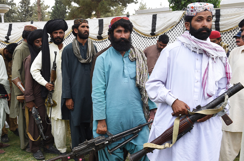 Baloch separatists carry their weapons as they prepare to surrender to Pakistani security forces in Quetta on April 21, 2017. (AFP/File)