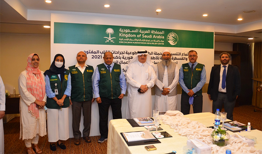 Saudi Ambassador to Pakistan Nawaf Bin Said Al-Malki (fourth from right) poses for a picture on July 6, 2021, after attending a coordination meeting ahead of a medical campaign started by KSRelief in Islamabad. (Photo courtesy: @KSAembassyPK/Twitter)