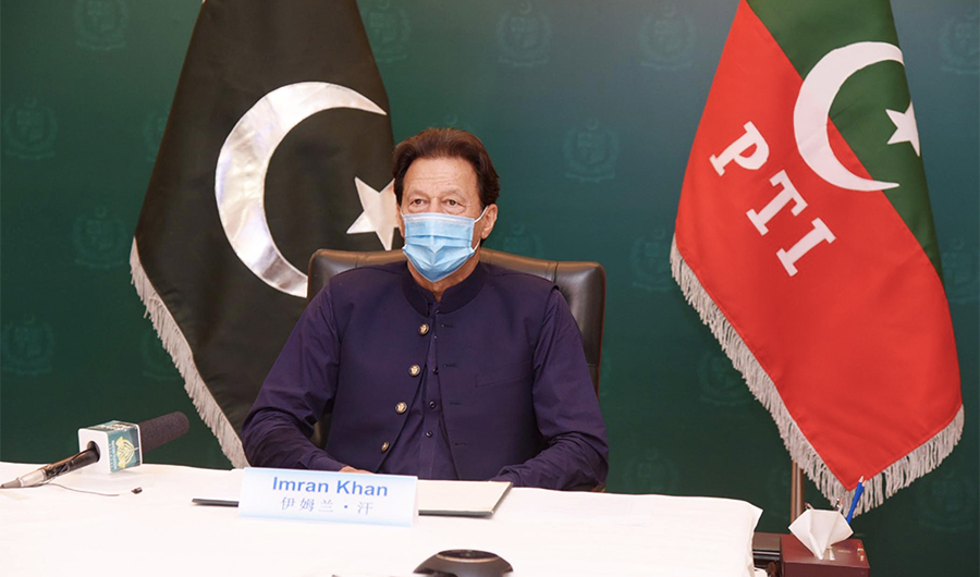 Pakistan's Prime Minister Imran Khan addresses a virtual ceremony to mark the 100th anniversary of the establishment of the Communist Party of China in Islamabad on July 06, 2021. (Photo courtesy: PID)