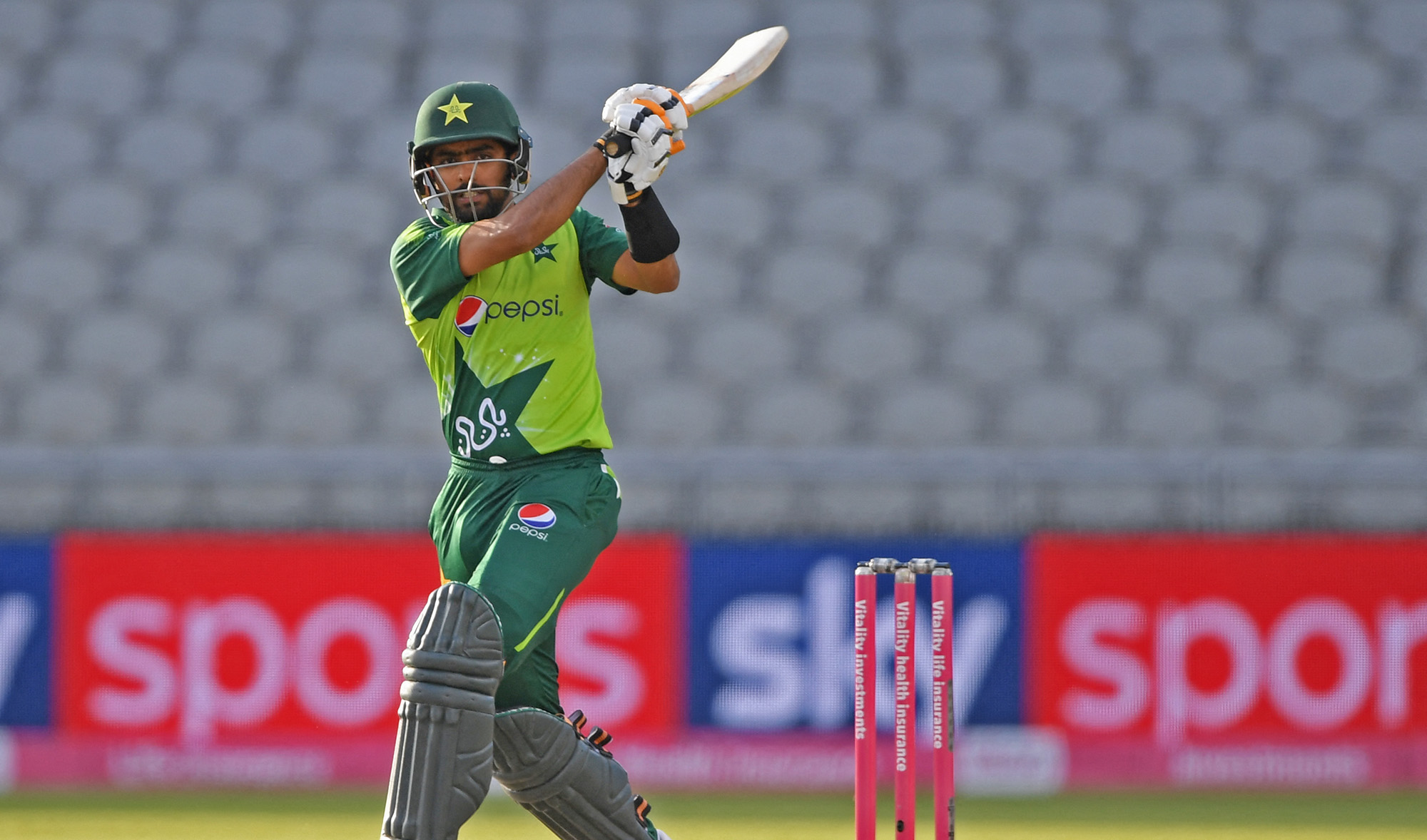 Pakistan's Babar Azam hits a four during the international Twenty20 cricket match between England and Pakistan at Old Trafford cricket ground in Manchester, north-west England, on September 1, 2020. (AFP/File)