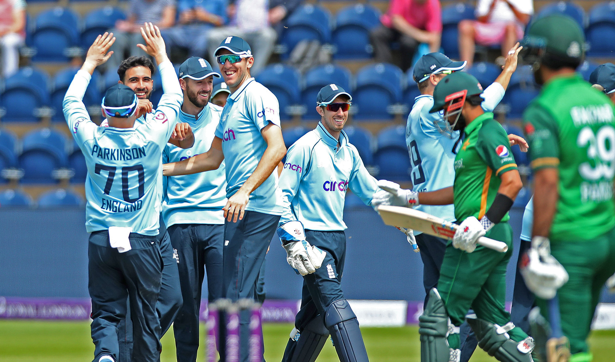 England's Saqib Mahmood celebrates taking the wicket of Pakistan's Babar Azam during the first ODI cricket match between both the teams in Cardiff on July 8, 2021. (Action Images via Reuters)