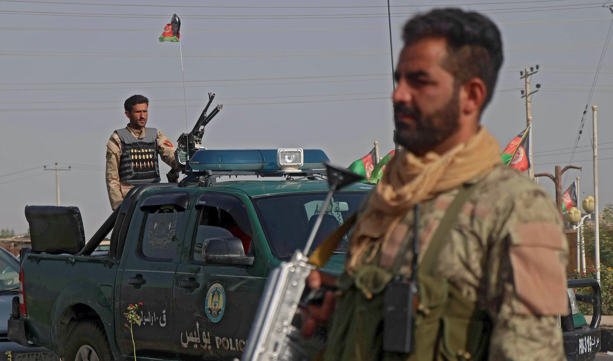 Afghan security forces keep watch at a checkpoint in the Guzara district of Herat province, Afghanistan July 9, 2021. (REUTERS)