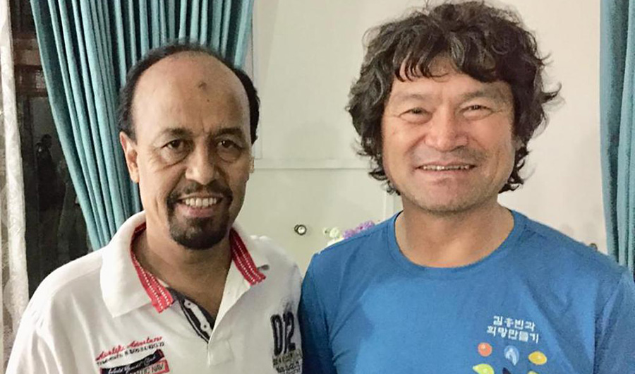 In this undated photo released by the Pakistan Alpine Club on Tuesday, July 20, 2021, shows club's secretary Karrar Haidri (left) and the now missing Korean climber Kim Hong Bin posing for a photograph, in Islamabad, Pakistan. (AP)