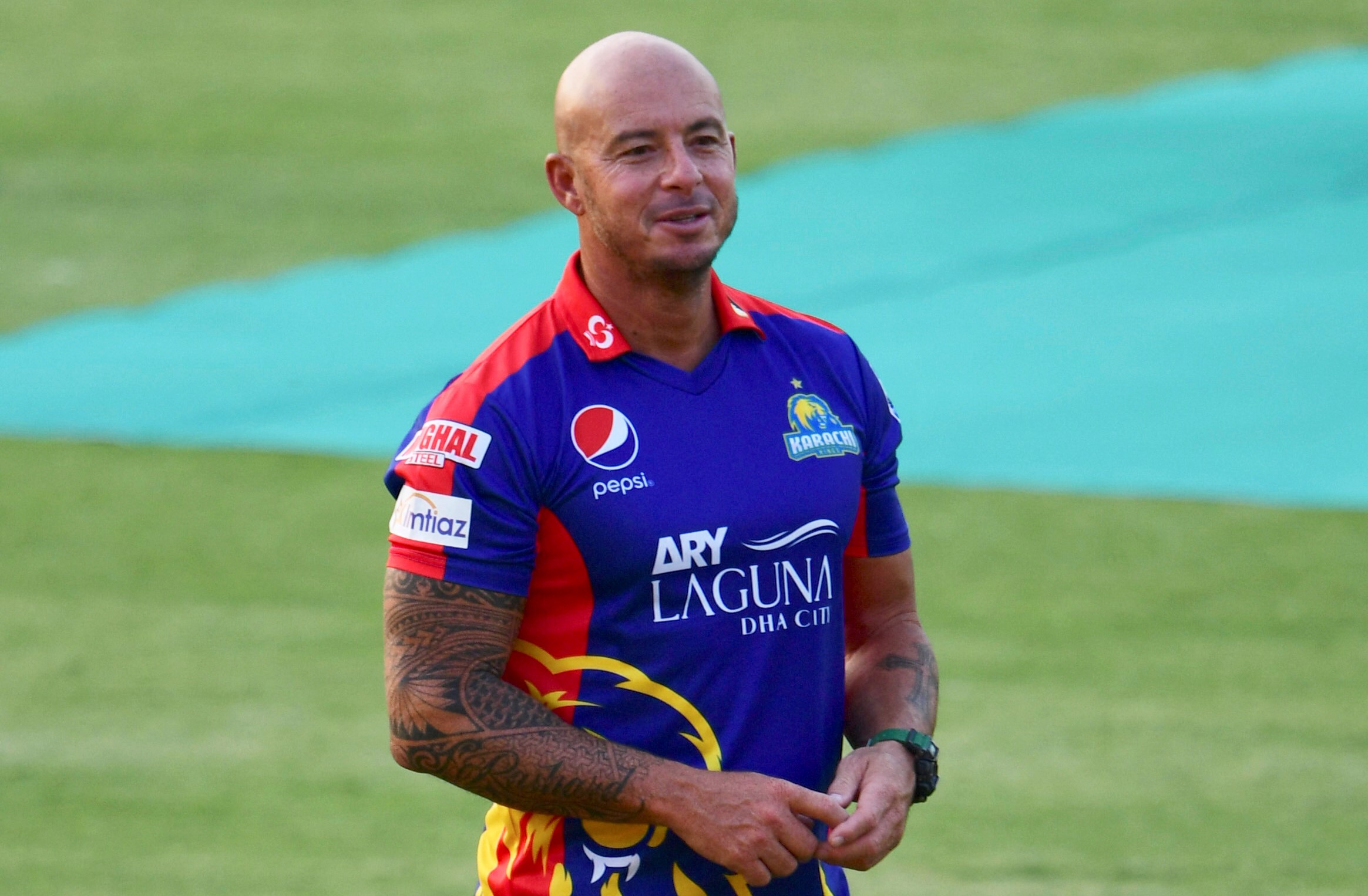 Karachi Kings Coach Herschelle Gibbs stands on the field before the opening ceremony of Pakistan Super League (PSL) in the National Stadium in Karachi on February 20, 2021. (AFP)