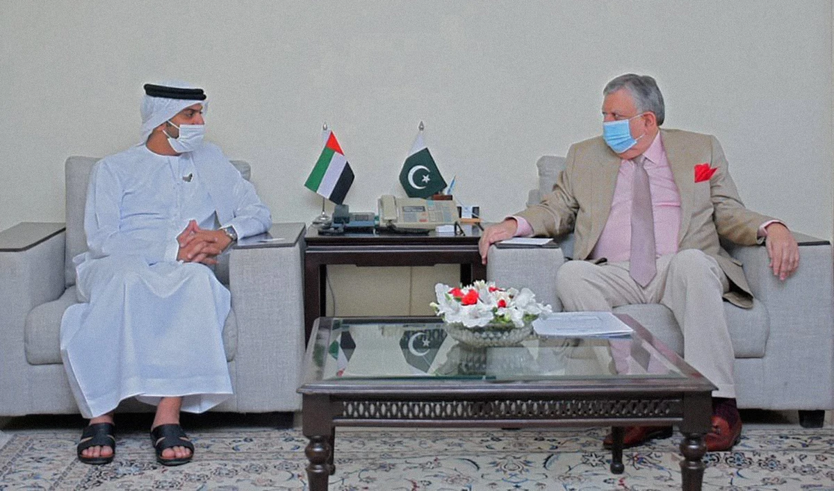UAE's Ambassador to Pakistan Hamad Obaid Alzaabi, left, and Pakistan's finance minister Shaukat Tariq during their meeting in Islamabad on July 1, 2021. (Photo courtesy: @uaeembassyisb/Twitter)