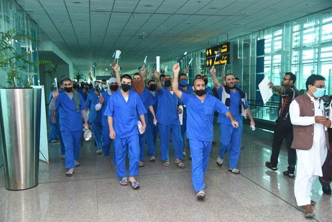 Pakistani prisoners released from Saudi Arabia celebrate their release from Saudi jails in Saudi Arabia on July 20, 2021. (Photo courtesy: Govt. of Pakistan)