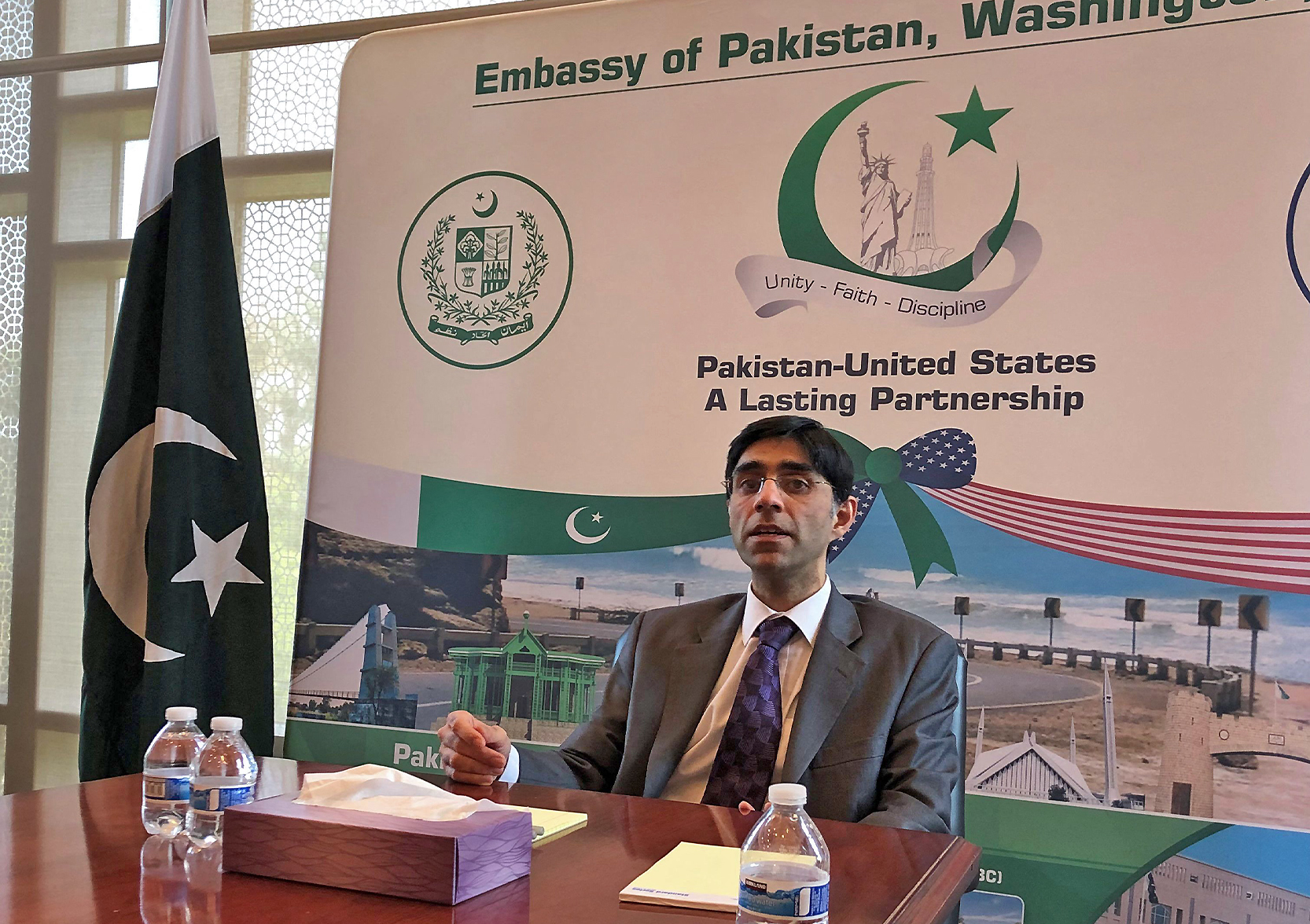 Pakistani national security adviser, Moeed Yusuf, speaks to reporters at the Pakistani embassy in Washington on August 4, 2021 after a week of meetings with US officials. (AFP)