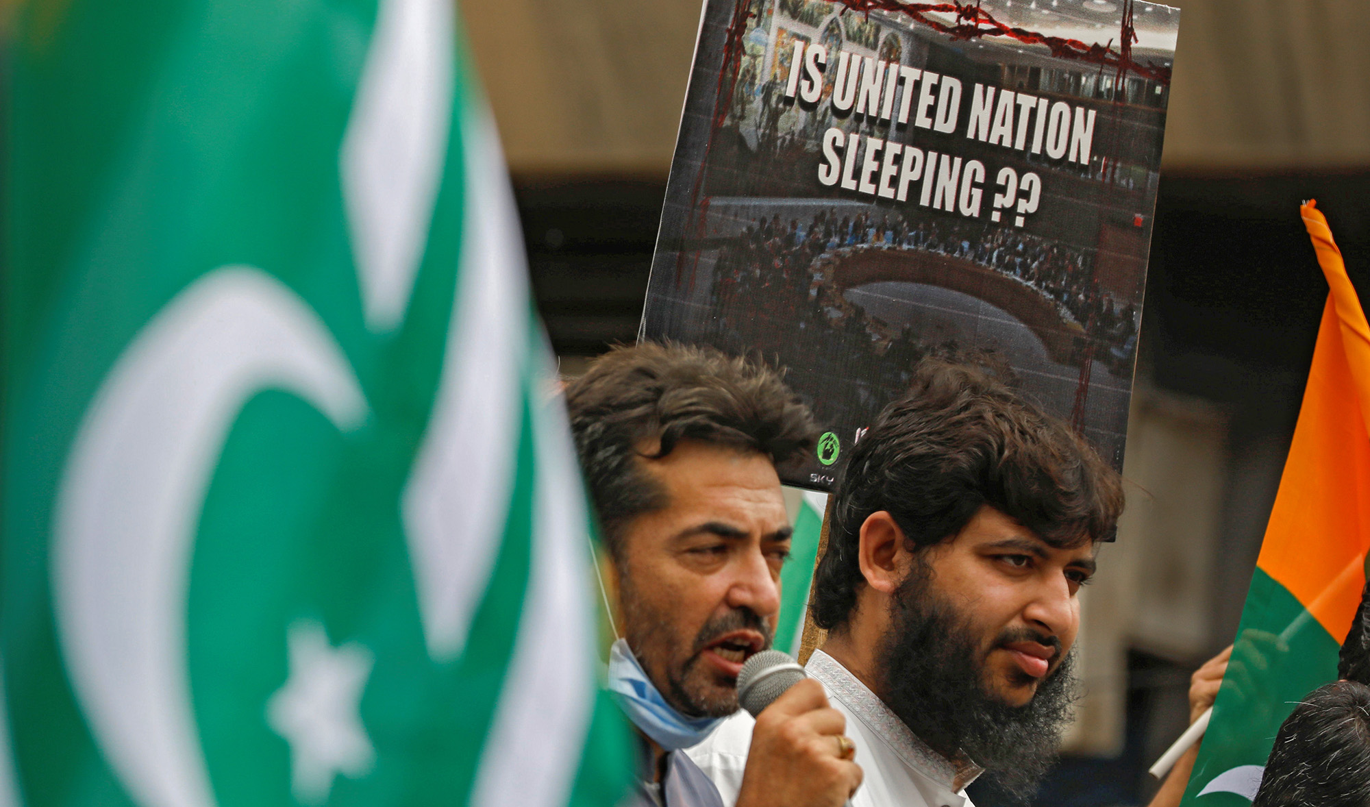 People attend a rally to mark the "Day of Exploitation in Kashmir", two years after the Indian government took away its special privileges, in Karachi, Pakistan, on August 5, 2021. (REUTERS)