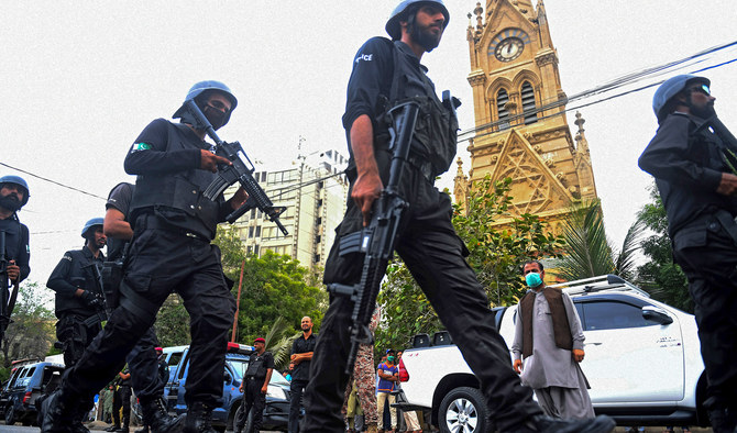 Police commandos patrol near the Pakistan Stock Exchange building in Karachi on June 29, 2020. (AFP/File)