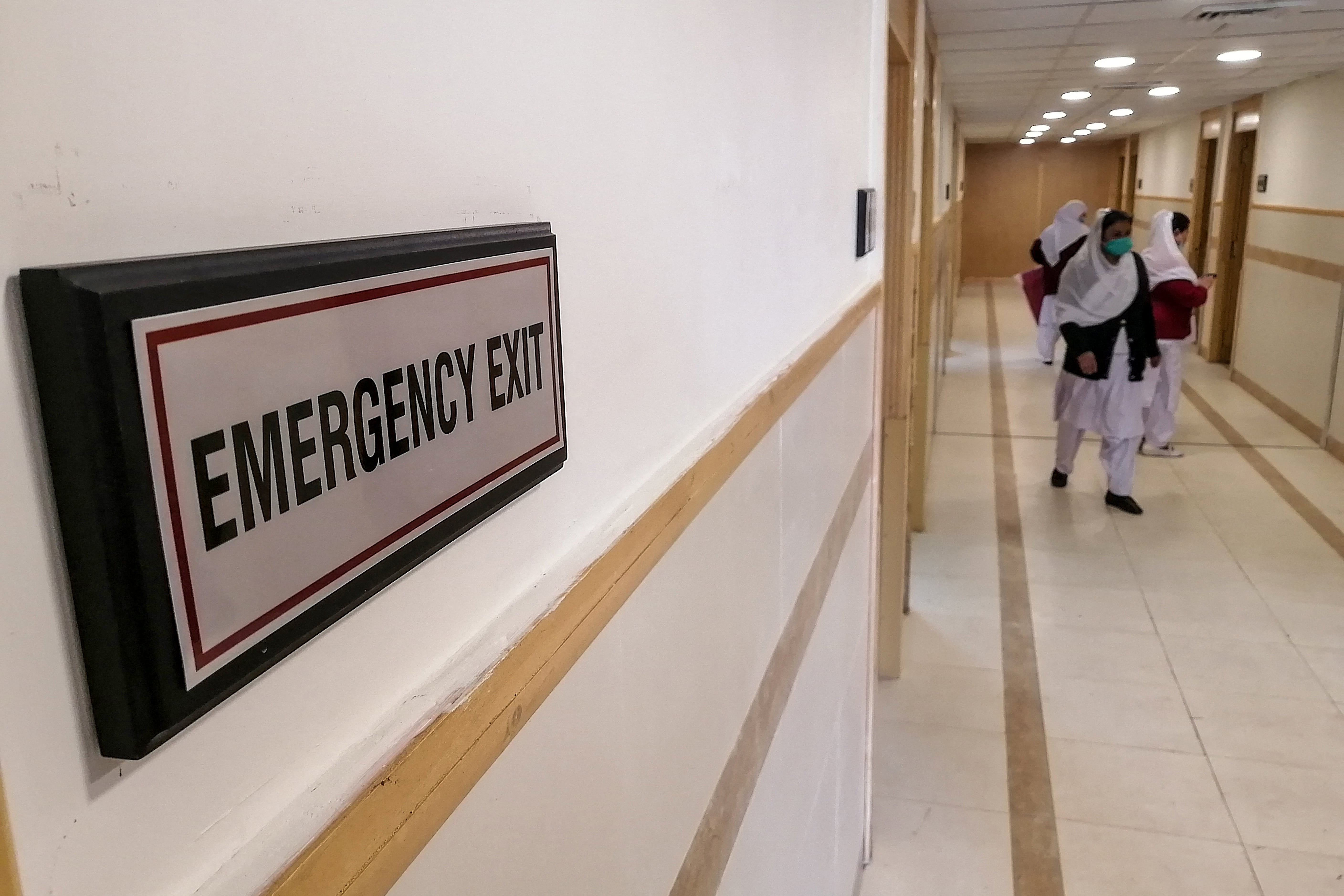Medical staff members wearing protective masks prepare rooms in an isolation ward as a preventative measure following the coronavirus outbreak, at the Pakistan Institute of Medical Sciences hospital in Islamabad on January 31, 2020. (AFP/ File)