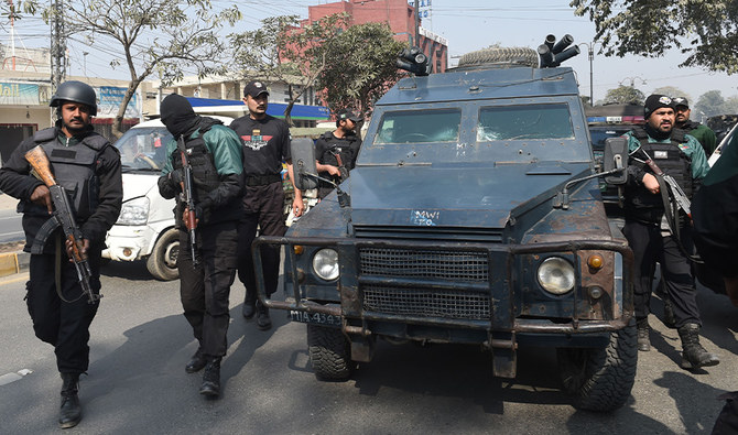 Pakistani policemen escort an armoured vehicle carrying a murder suspect outside an anti-terrorist court in Lahore on February 9, 2018. (AFP/File)