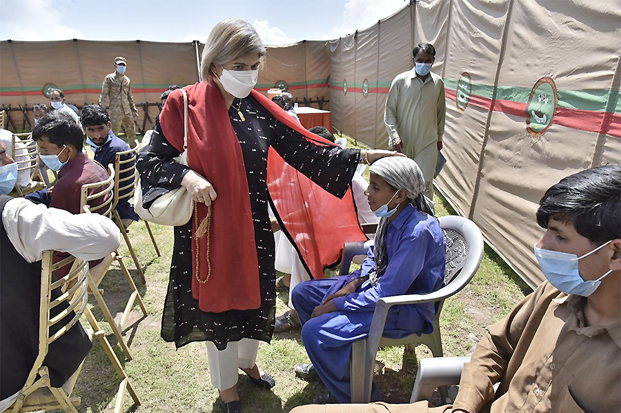 Organization of Islamic Cooperation representatives visit refugees from Indian-controlled Kashmir at a camp in Muzaffarabad, Pakistan's Azad Jammu and Kashmir on August 6, 2021. (Photo courtesy: AJK government)